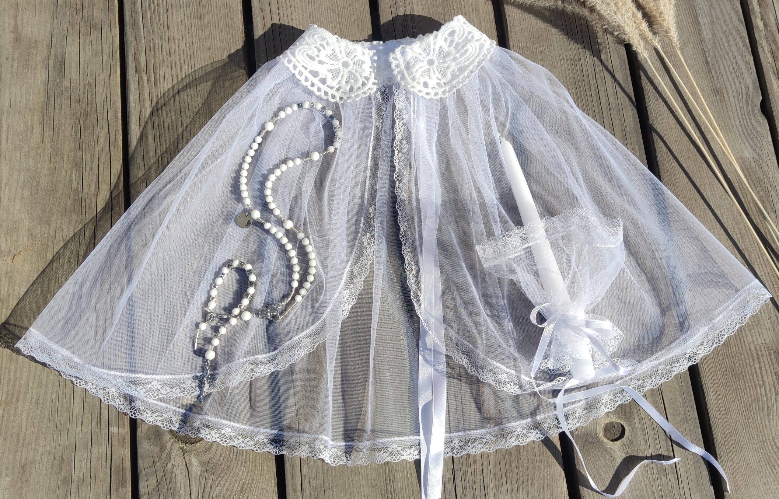 Baltu apsiuvimu skraistė